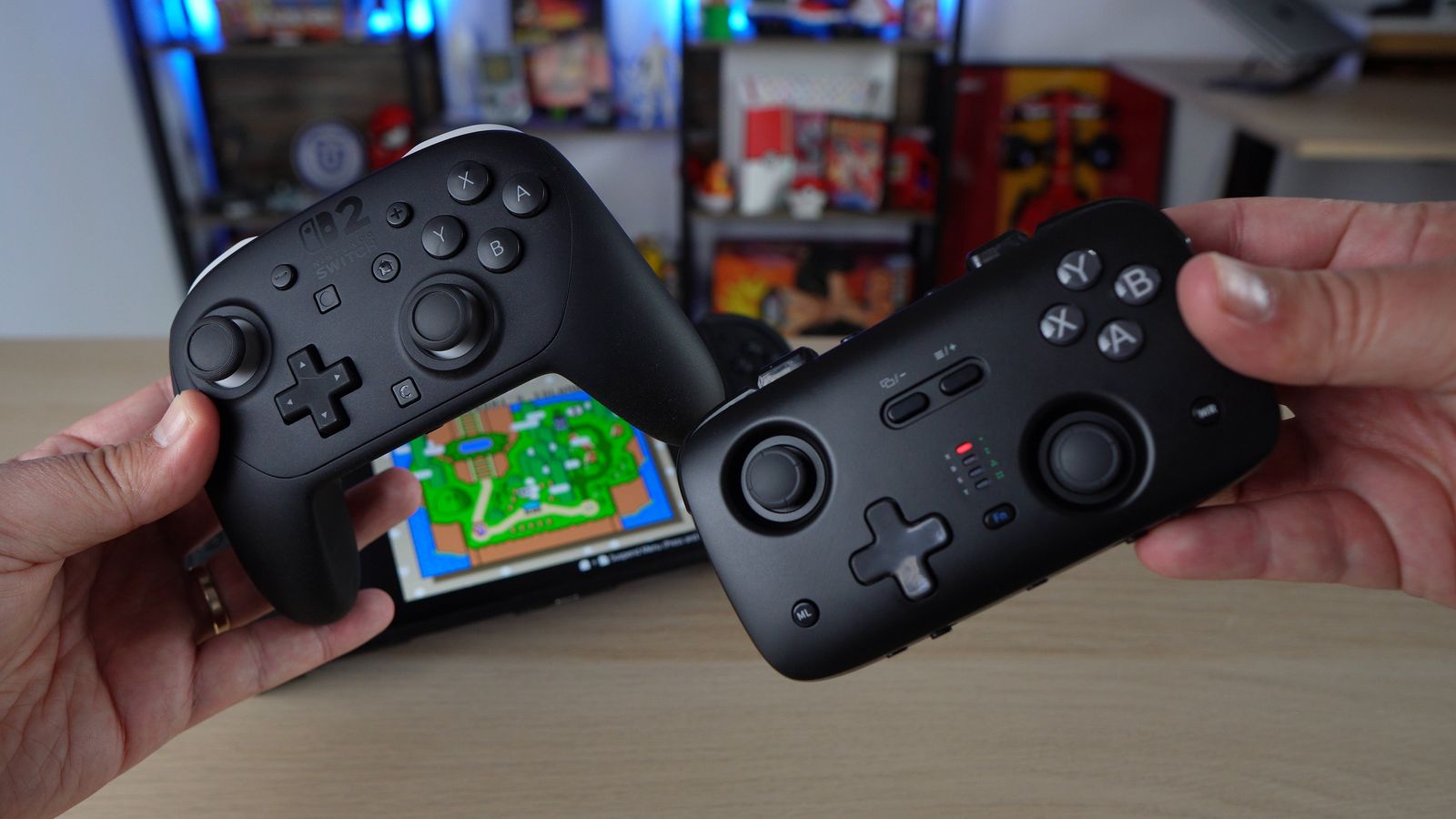 The Voidjoy SkyLark S1 Pro next to the much larger Nintendo Switch 2 Pro Controller